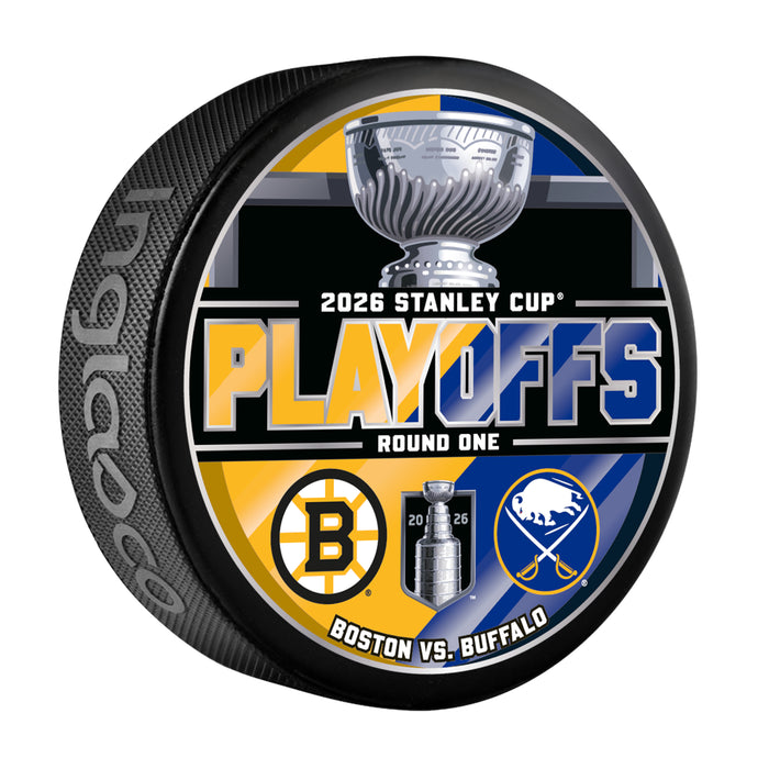 Boston Bruins vs Buffalo Sabres NHL 2026 Stanley Cup Playoffs Round One dueling puck with gold and blue split background