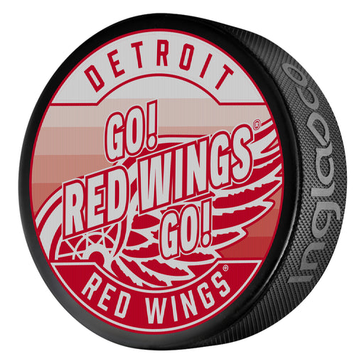 NHL Detroit Red Wings Go Red Wings Go rally lenticular puck with winged wheel logo and red graphics
