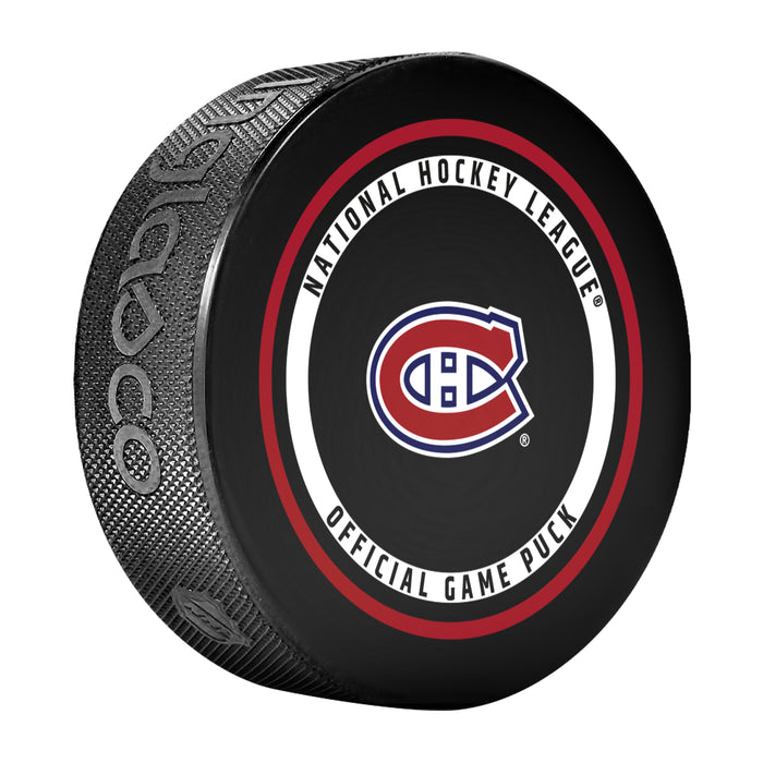 Montreal Canadiens NHL Official Game Puck angled view with red-ringed circular border around team logo
