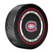 Montreal Canadiens NHL Official Game Puck angled view with red-ringed circular border around team logo