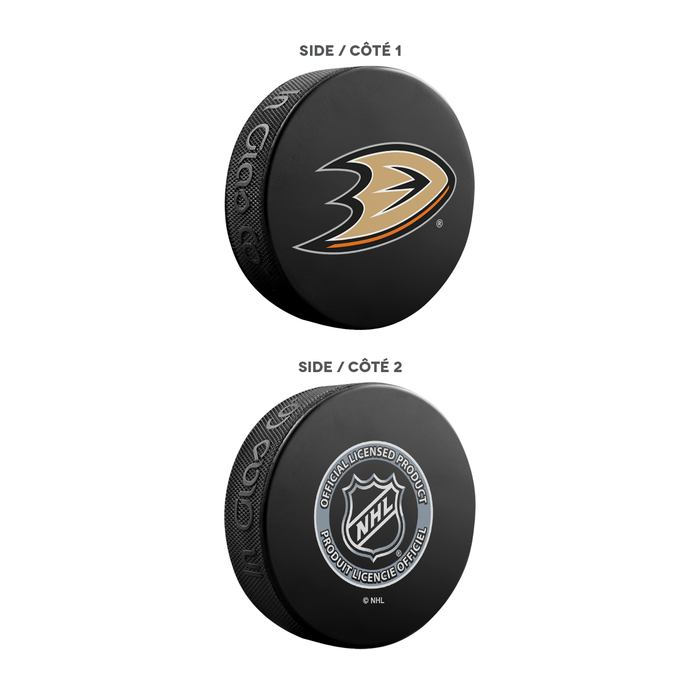 NHL Anaheim Ducks Ultimate Fan 3-Pack. Includes: 1 NHL Official Classic Souvenir Hockey Puck / 4 Coasters / 1 Media Device Holder