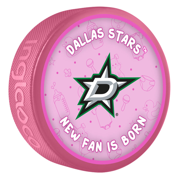 NHL Dallas Stars New Fan Is Born pink souvenir hockey puck with team D star logo on baby-themed background