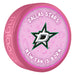NHL Dallas Stars New Fan Is Born pink souvenir hockey puck with team D star logo on baby-themed background