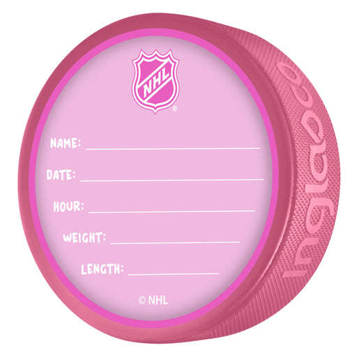 NHL Edmonton Oilers pink souvenir puck back with NHL shield and fill-in baby birth record fields
