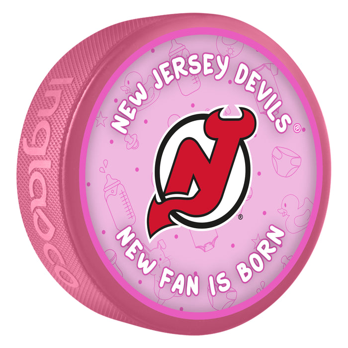 NHL New Jersey Devils pink New Fan is Born souvenir puck with team logo and baby items pattern