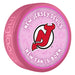 NHL New Jersey Devils pink New Fan is Born souvenir puck with team logo and baby items pattern