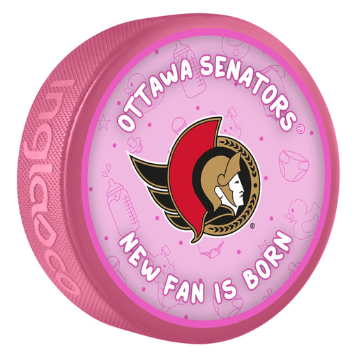 NHL Ottawa Senators pink New Fan is Born souvenir puck with team logo and baby items pattern