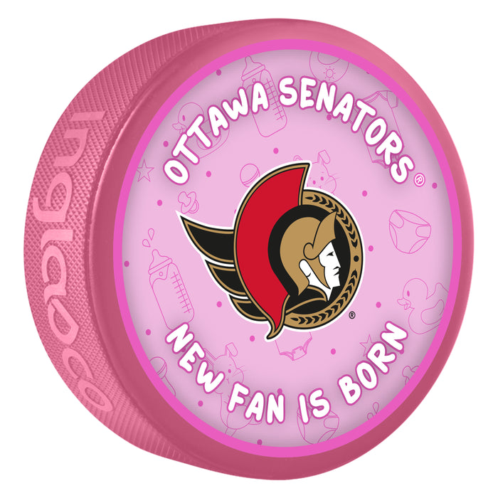 NHL Ottawa Senators pink New Fan is Born souvenir puck with team logo and baby items pattern
