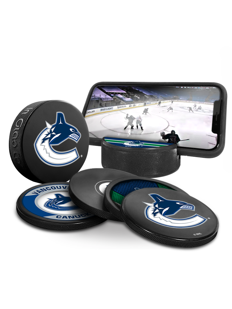 NHL Vancouver Canucks Ultimate Fan 3-Pack. Includes: 1 NHL Official Classic Souvenir Hockey Puck / 4 Coasters / 1 Media Device Holder